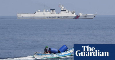 The Guardian-China coast guard deploys floating barrier to cut off disputed South China Sea shoal