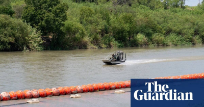 The Guardian-Texas ordered to remove buoys meant to block migrants from Rio Grande River