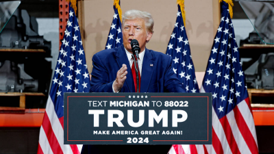 Politics-Trump jabs at Menendez and Biden in Michigan