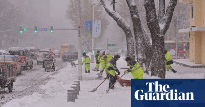 The Guardian - China-Weather Tracker Unseasonal cold air brings widespread snowfall to China