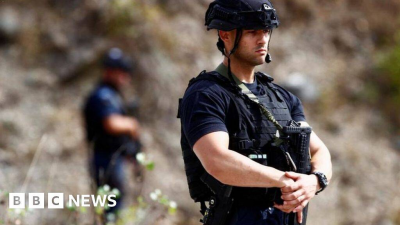 BBC News Top Stories-World Kosovo police surround 30 gunmen in monastery after officer shot