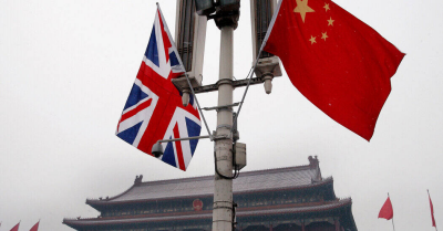 纽约时报中文网 - 英文原版-英China Acknowledges Imprisoning a British Man on Spy Charges