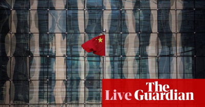 The Guardian-Chinas credit outlook cut to negative on debt worries UK grocery inflation slows  business live