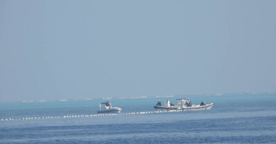 Reuters-Philippines condemns Chinese floating barrier in South China Sea