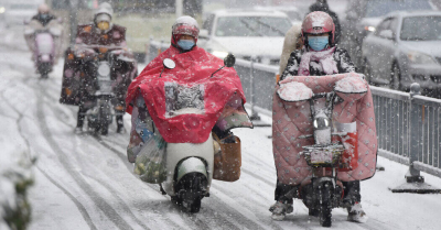 纽约时报中文网 - 英文原版-英Severe Weather Disrupts Travel in China Ahead of Lunar New Year