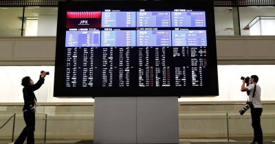 Reuters-Asian shares dragged lower by China dollar on back foot